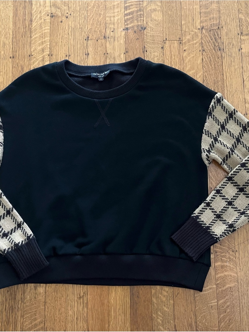 Central Park West Black Sweatshirt with Beige Plaid Sleeves